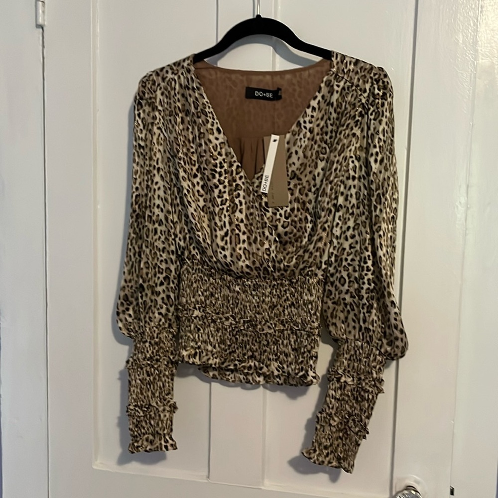 NWT Do Be leopard cross over blouse with elastic waist and cuffs size small